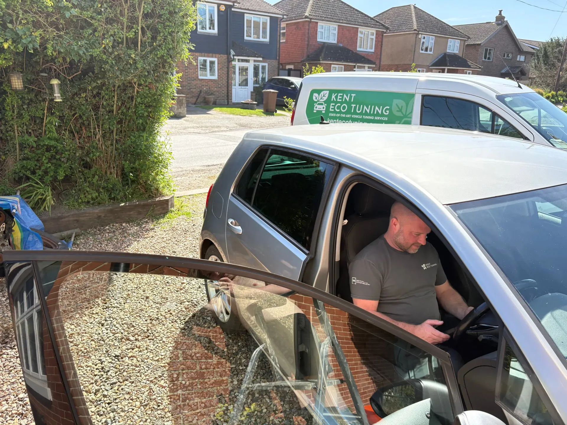 Technician carrying out on-site diagnostics on a Volkswagen in Kent before ECU remapping.